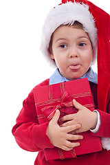 Image showing santa kid sticking out tongue