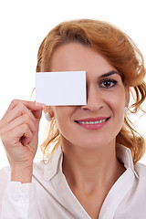 Image showing woman holding blank card over her eye 