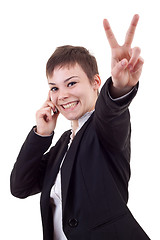 Image showing woman with phone and victory gesture