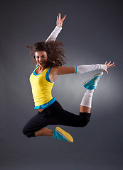 Image showing hip hop dancer jumping 