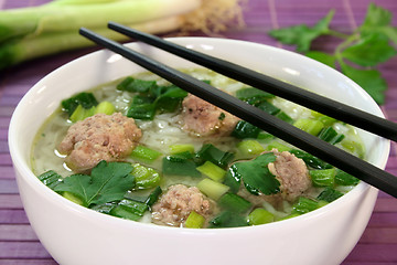 Image showing Rice soup with meat balls