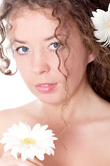 Image showing young pretty woman with flower