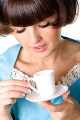 Image showing woman enjoying a cup of coffee 