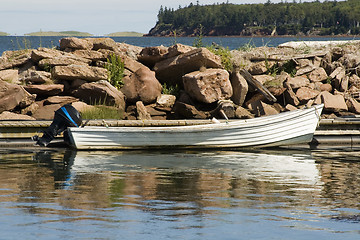 Image showing Wooden Boat and Motor