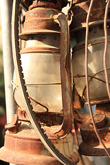 Image showing rust and brocken kerosene lamp 