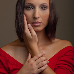 Image showing attractive girl in red top