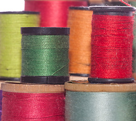 Image showing Multicolored Spools Of Sewing Thread