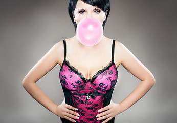 Image showing sexy brunette with bubblegum