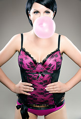 Image showing sexy brunette with bubblegum