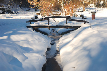 Image showing Wooden bridge and brook