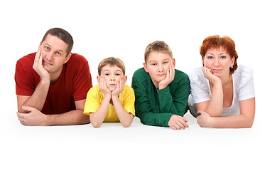 Image showing family of four on the floor