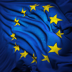 Image showing The European Union flag, fluttering in the breeze, backlit risin