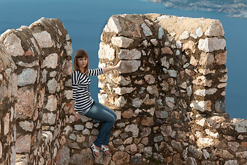 Image showing girl on the wall