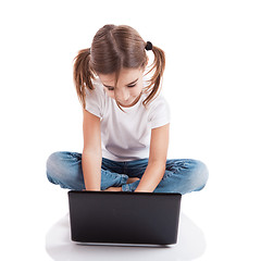 Image showing Little student girl with a laptop