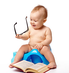 Image showing Child on potty