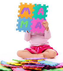 Image showing Little girl with alphabet