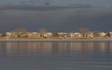 Image showing skyline of Colorado houses across frozen lake