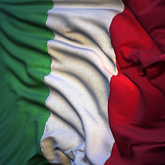 Image showing Flag of Italy, fluttering in the breeze, backlit rising sun