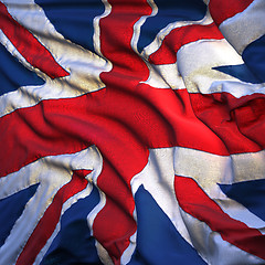 Image showing Flag of the United Kingdom, fluttering in the breeze, backlit ri