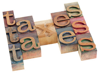 Image showing taxes word abstract