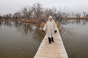 Image showing senior woman enjoys a walki alone