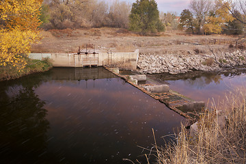 Image showing water flowing into irrigation ditch