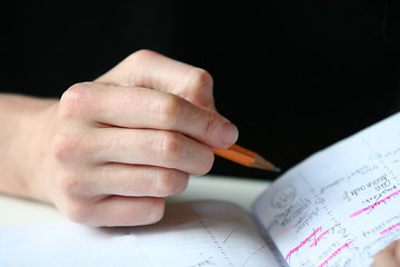 Image showing Hand with pencil