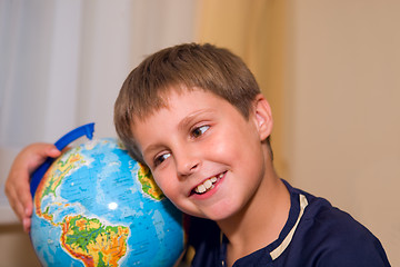 Image showing boy with globe of world 