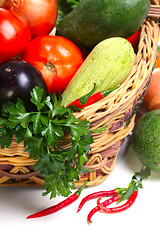 Image showing basket with vegetables isolated on white 