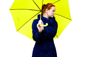 Image showing redhead young woman holding an  umbrella
