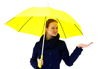 Image showing redhead young woman holding an umbrella