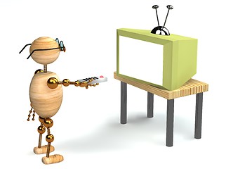 Image showing 3d wood man is watching tv