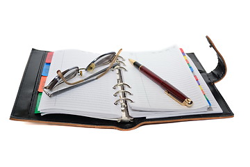 Image showing Planner, pen and eyeglasses isolated on white background