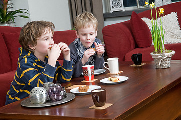 Image showing Two brothers in a livingroom