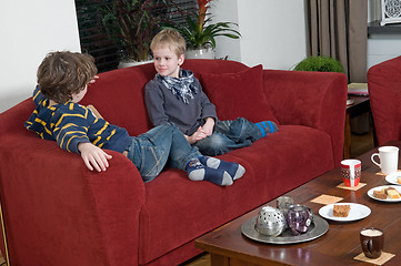 Image showing Two brothers on the couch 