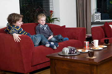 Image showing Two brothers on the couch 