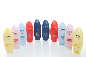 Image showing Selection of Dove Therapy Shampoos and Conditioners