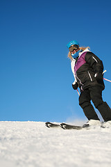 Image showing Female skiier