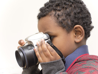 Image showing The young photographer