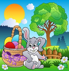 Image showing Spring meadow with bunny and basket