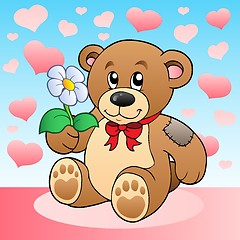 Image showing Teddy bear with flower and hearts