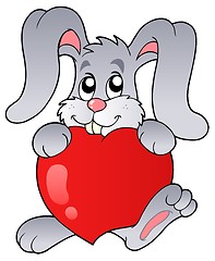 Image showing Cute bunny holding heart