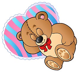 Image showing Teddy bear on heart shaped pillow