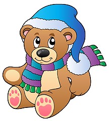 Image showing Cute teddy bear in winter clothes