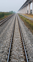 Image showing Converging railway tracks