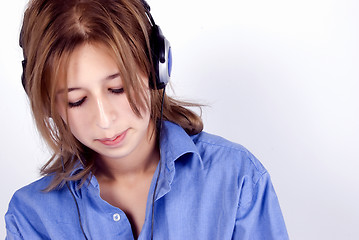 Image showing Young girl in headphones   