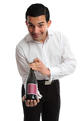 Image showing Waiter or servant presenting wine