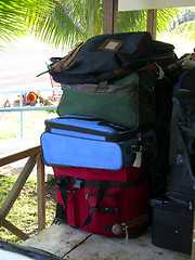Image showing luggage in cart at airport with palm trees Corn Island Nicaragua
