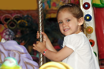 Image showing Child in carousel