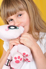 Image showing child with a toy cat